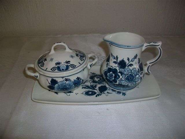 Vintage blue and white delft sugar basin and milk jug on tray