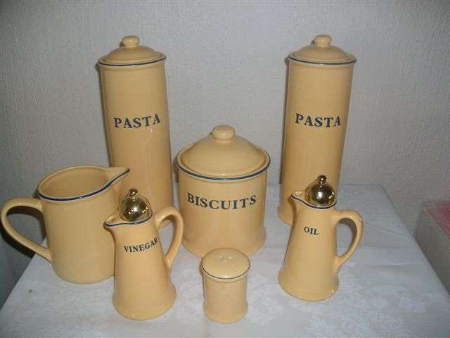 7 piece kitchen set with storage containers , oil and vinegar bottles etc