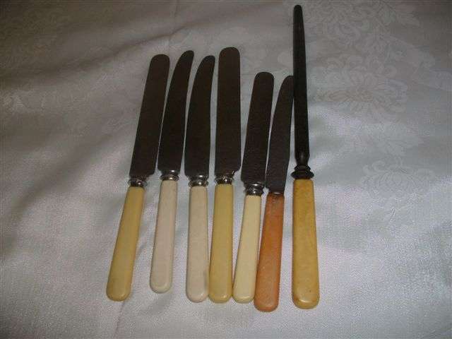 Some vintage bone handle knives with bone handle knife sharpener