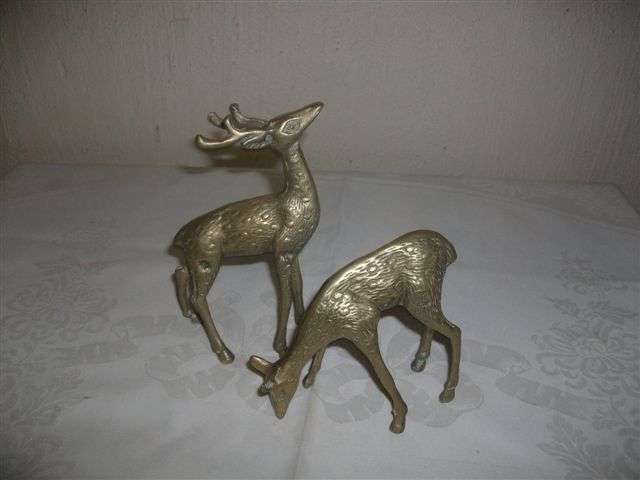 A pair of brass dears