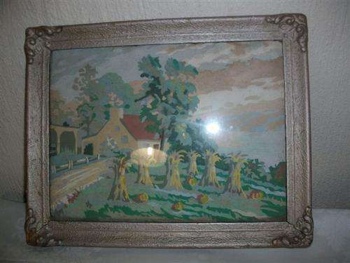 Small vintage ornate frame with country scene print behind glass