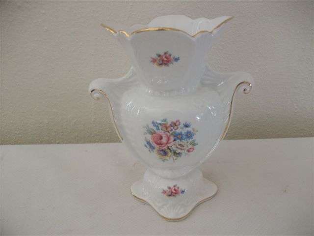 Pretty vintage vase , plain white with some flowers