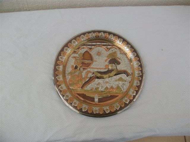 Gorgeous two toned brass and copper eyepation style wall plate