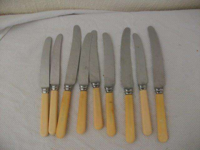 Nice set of nine vintage bone handle table knives