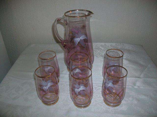 Simply gorgeous  light pink glass juice set with matching glasses