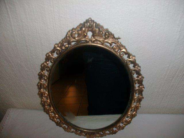 Ornate metal gold painted wall mirror