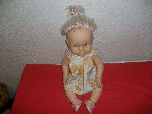 Collectable ? hard plastic wet doll in need of tlc