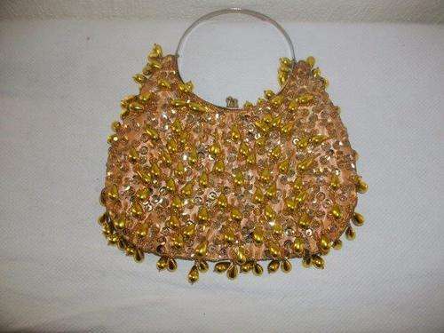 Dazzling gold evening bag with beads