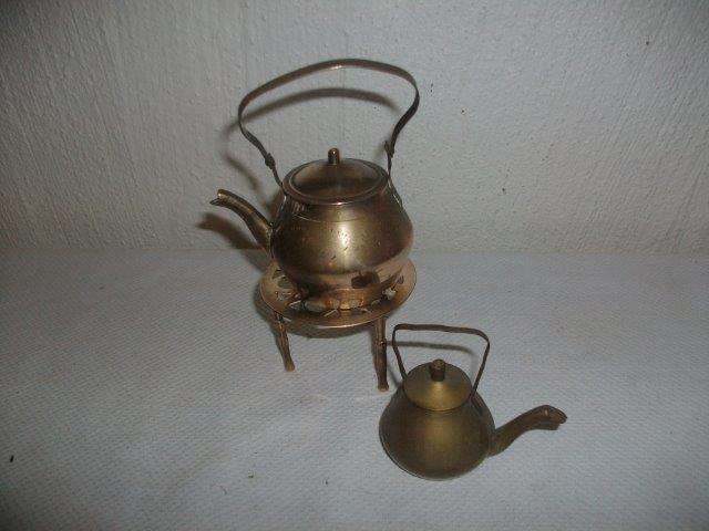 Two lovely small brass kettles one on stand other not