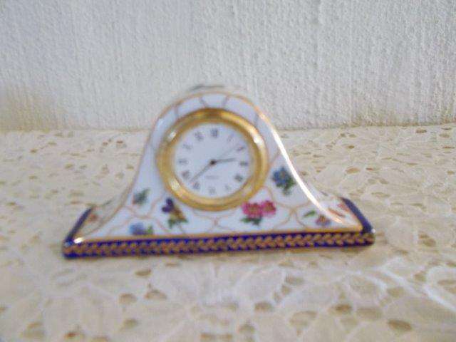 Stunning ceramic miniature battery operated clock in working order