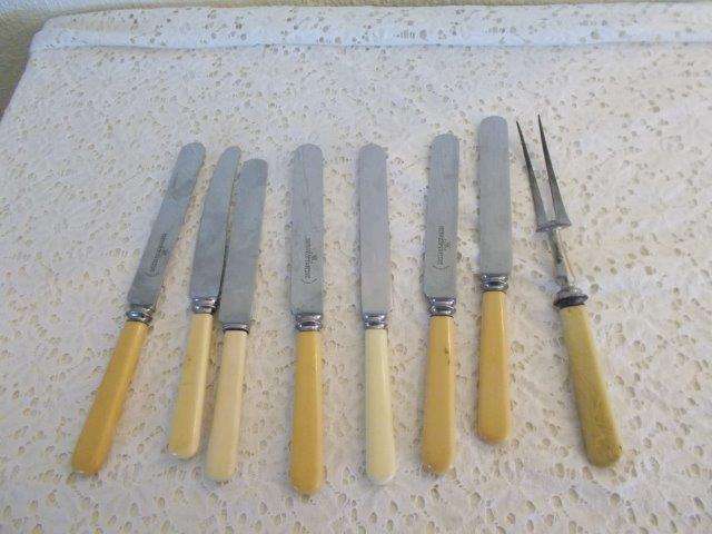 lot 2 a set of large bone handle knifes with craving fork