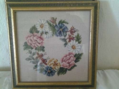 nice framed behind glass round flower arragement taperstry