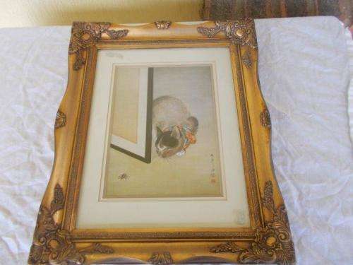 Stunning oriental singed silk tapersty of a cat behind glass in a ornate frame