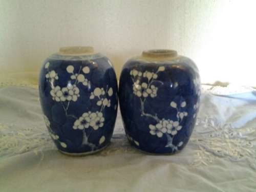 A pair of pretty blue and white ginger jars with no lids