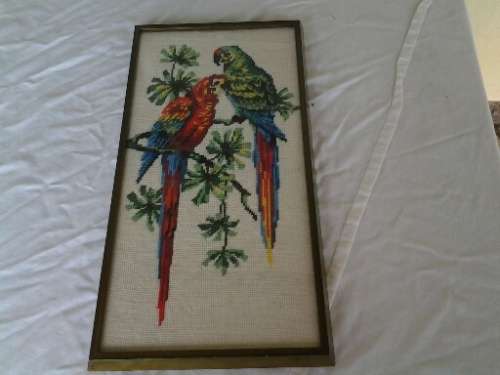 nice parrot tapestries behind glass