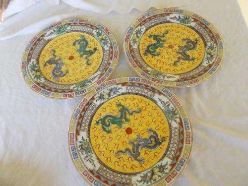 Three stunning oriental dragon style dinner plates