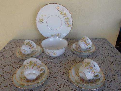 A part vintage floarl victorain looking porcelain tea set