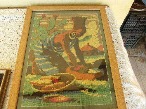 framed behind glass a african lady scene taperstry