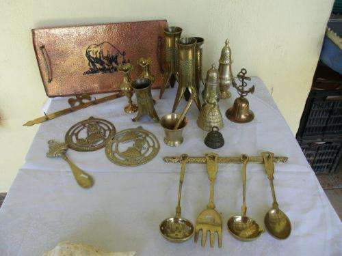 collection of brass and some copper items up for sale