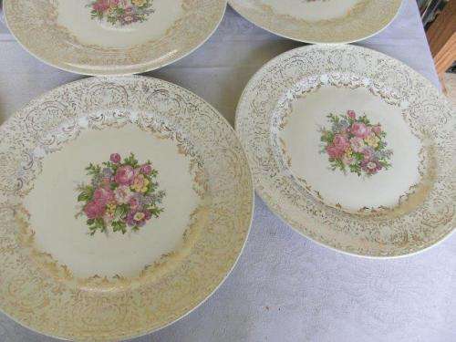 A set of eight stunning floarl eggshell georain dinner plates