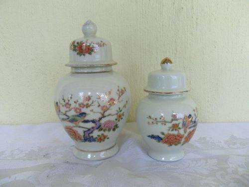 A pair of small oriental bird scene  pattern porcelain jars