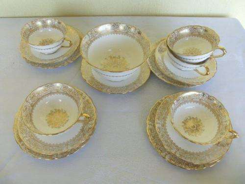 stunning gold and white new chelesa porcelain tea cup trios and sugar bowl