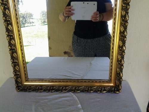 large gold orante framed wall mirror