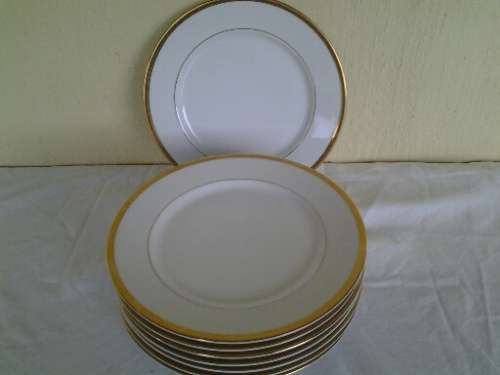 Set of eight mordern made for woolworths white and gold side plates