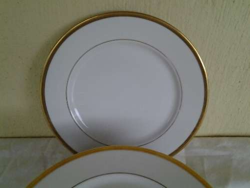 Set of eight mordern made for woolworths white and gold side plates