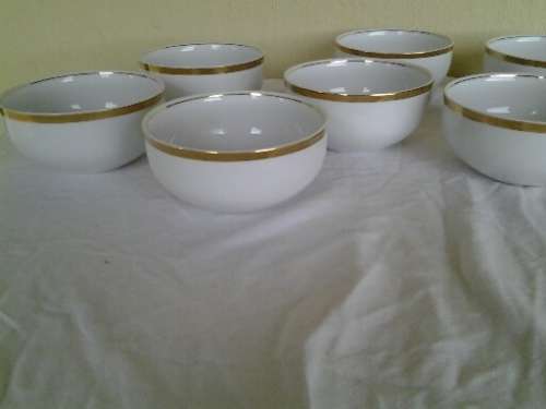 Set of eight modern white and gold made for woolworths pudding bowls