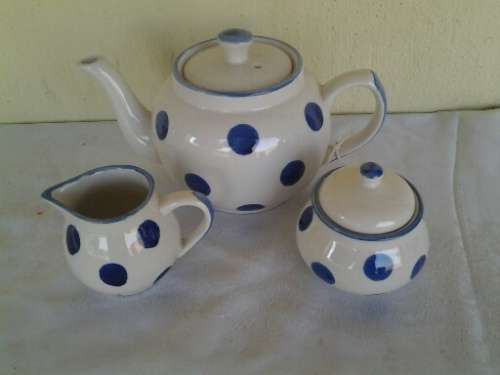 modern but pretty porcelain polka dot tea pot milk and sugar bowl set
