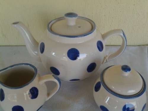 modern but pretty porcelain polka dot tea pot milk and sugar bowl set