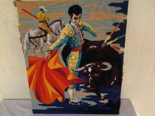 unframed nice tapestry of a bull fighter