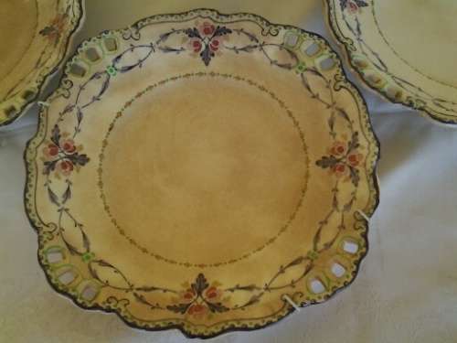 three pretty old vintage wall plates with crazing