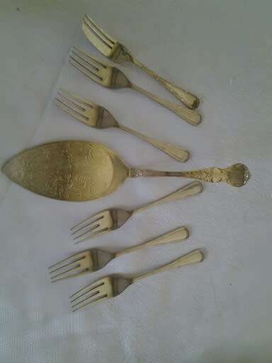 vintage sliver plated cake lifter and six cake forks