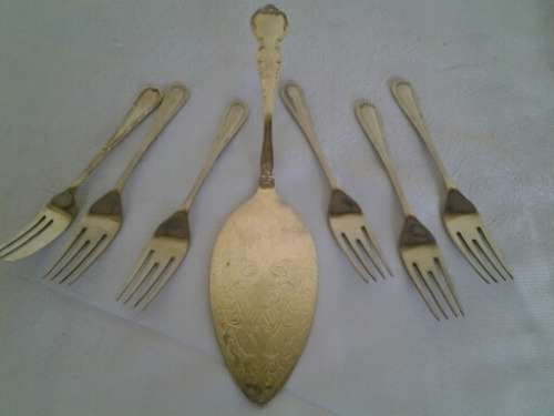 vintage sliver plated cake lifter and six cake forks