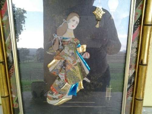stunning framed material made oriental  Geshia lady