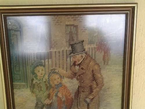 stunning vintage scene of a old man and two childern  tapestry framed behind glass
