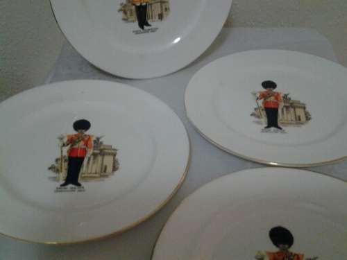 a lot of four Royal Windsor , collectable royal guard plates