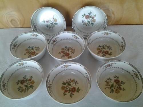A stunning set of eight Royal doulton Kings wood small porcelain pudding bowls