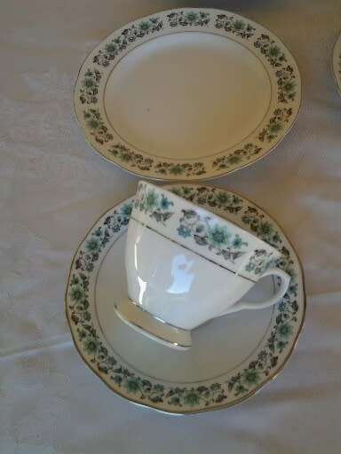 A set of six more modern porcelain tea cup trios