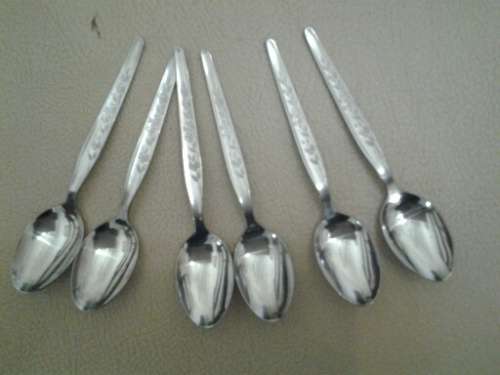 Set of six small  depermaisse stainless steel tea spoons