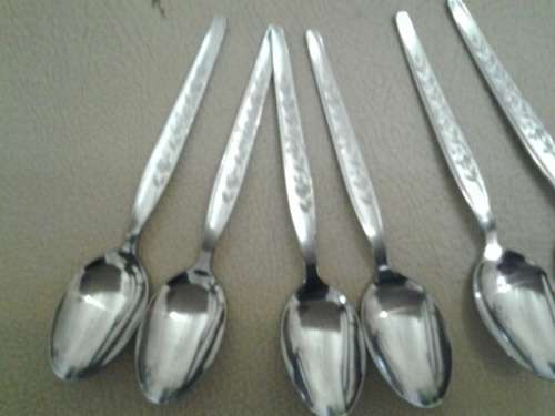 Set of six small  depermaisse stainless steel tea spoons