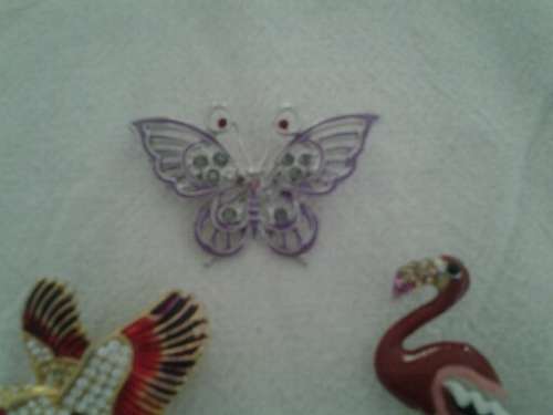 five ladies assorted pretty costume brooches