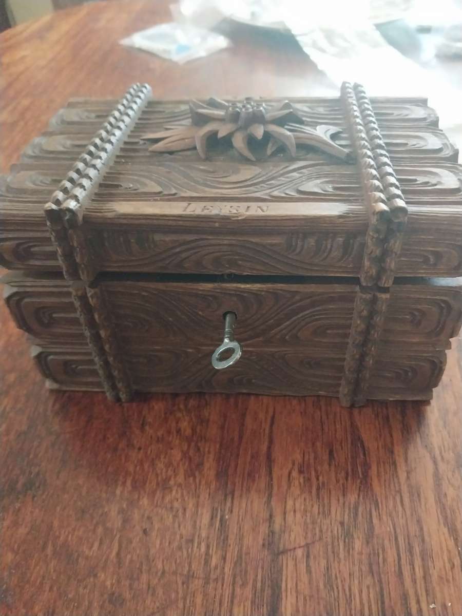 Vintage wooden craved box with key