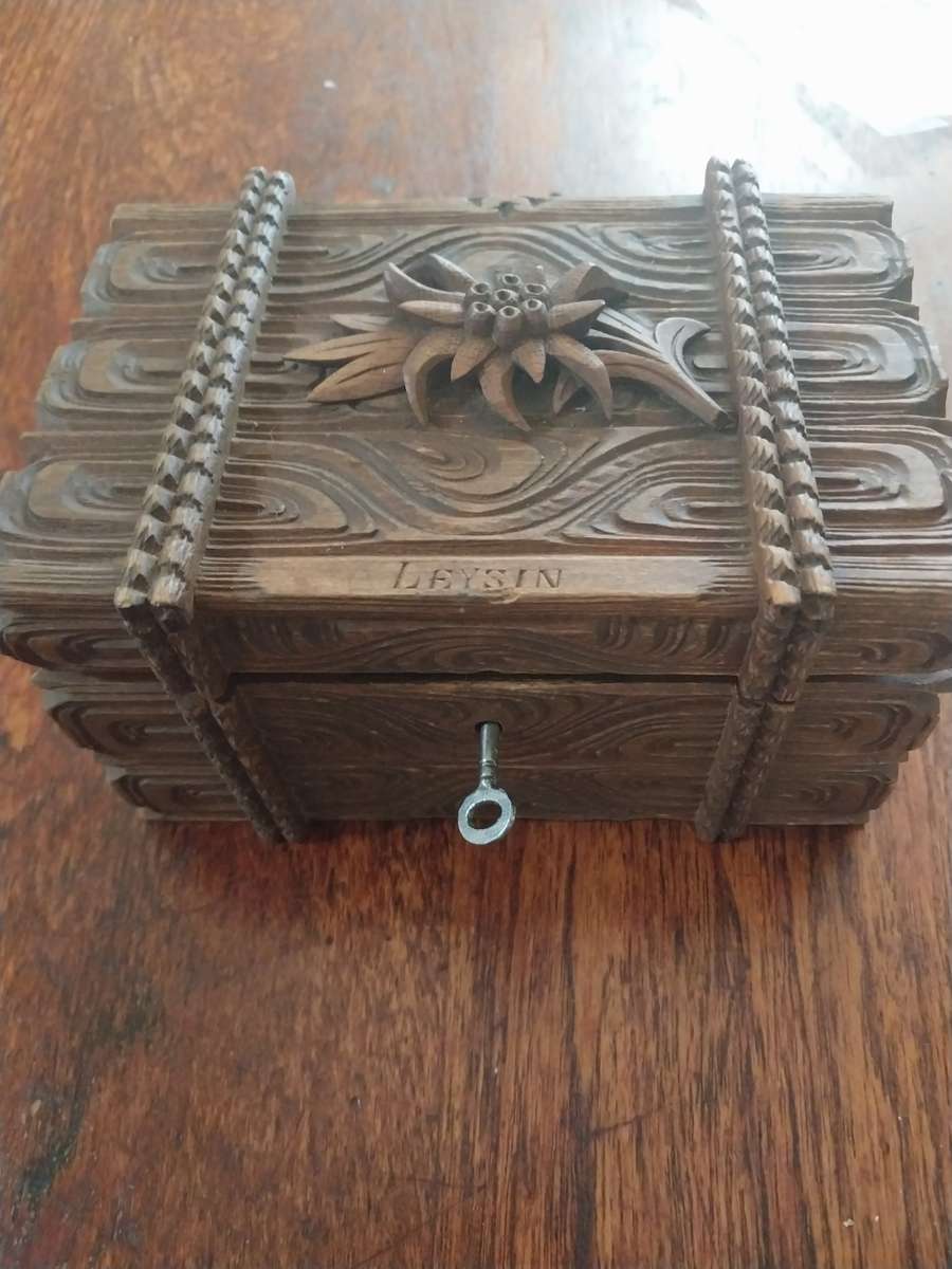 Vintage wooden craved box with key