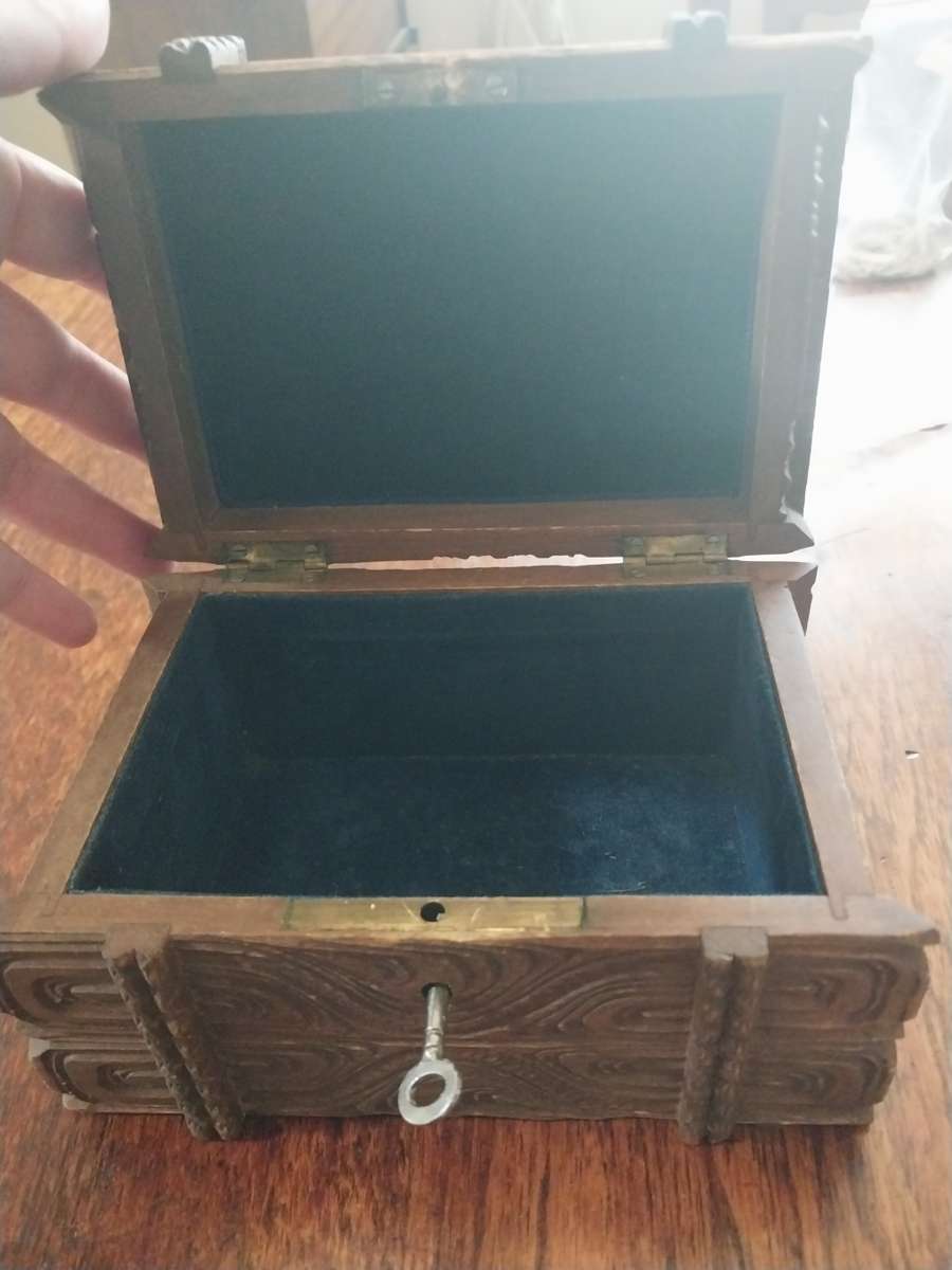 Vintage wooden craved box with key