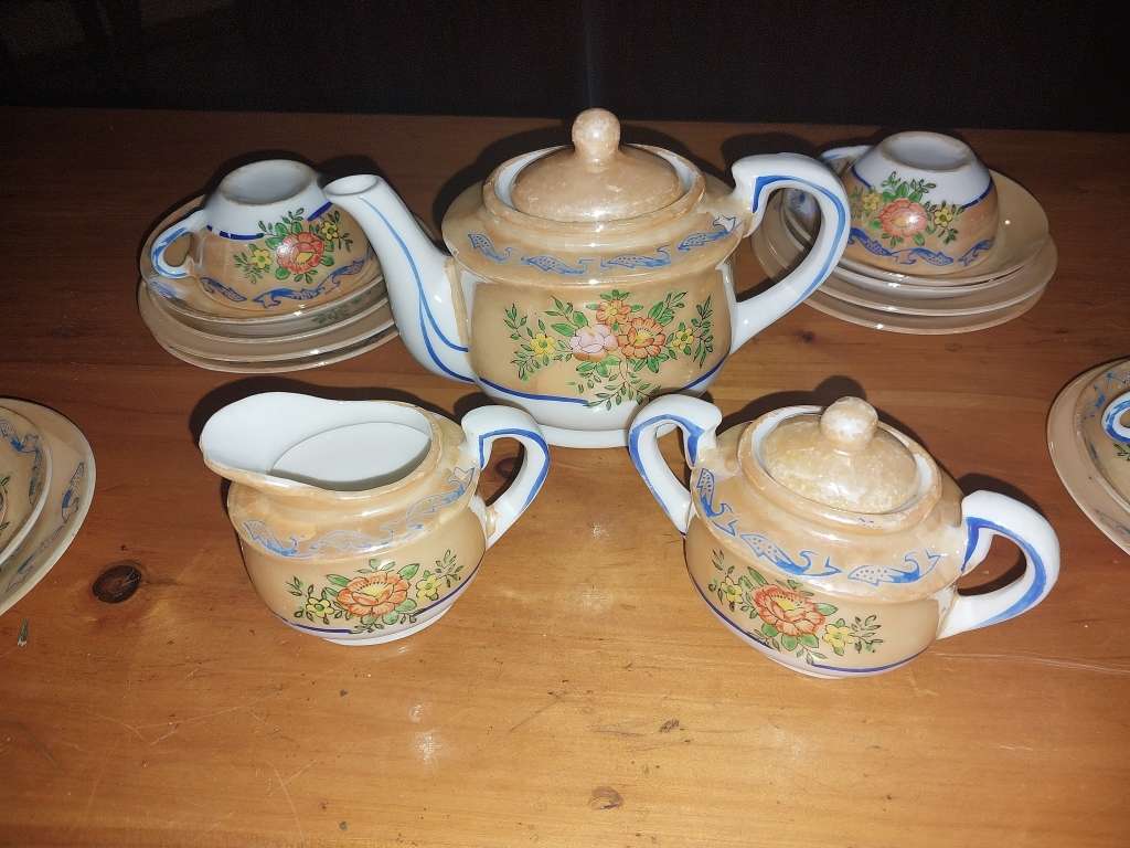 Collectable part procelain doll set