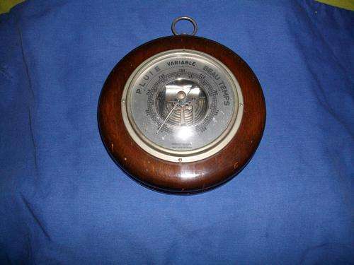 small wooden barometer