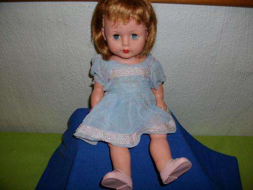 doll with blue dress in hard plastic
